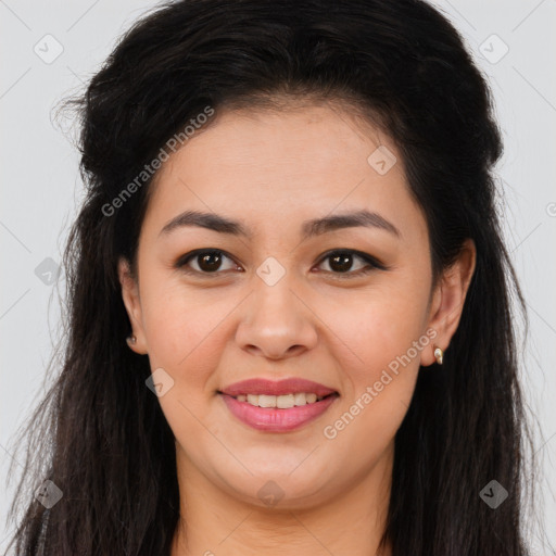 Joyful latino young-adult female with long  brown hair and brown eyes