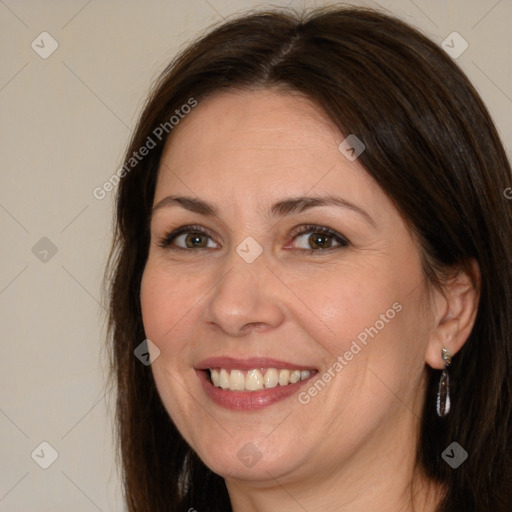 Joyful white adult female with medium  brown hair and brown eyes