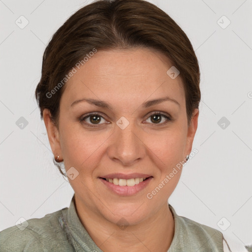 Joyful white adult female with short  brown hair and brown eyes