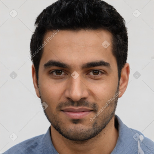 Joyful latino young-adult male with short  black hair and brown eyes