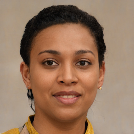 Joyful latino young-adult female with short  brown hair and brown eyes