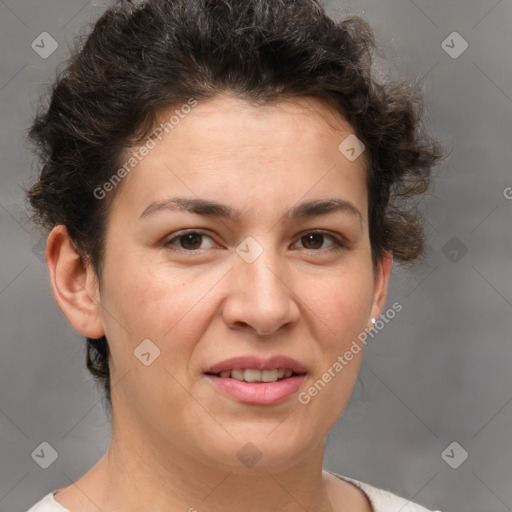 Joyful white adult female with short  brown hair and brown eyes