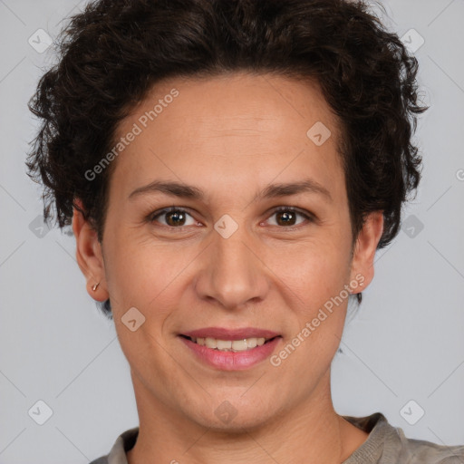 Joyful white adult female with short  brown hair and brown eyes