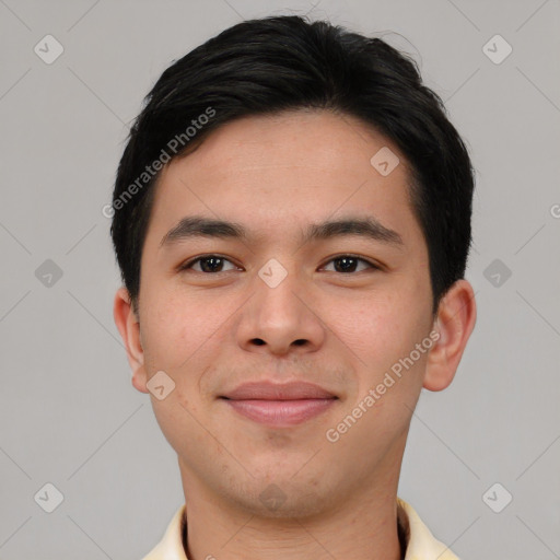 Joyful asian young-adult male with short  black hair and brown eyes