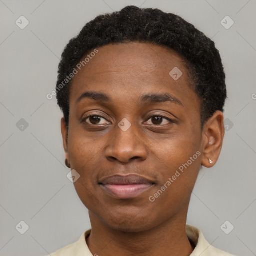 Joyful black adult female with short  brown hair and brown eyes