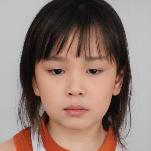 Neutral asian child female with medium  brown hair and brown eyes