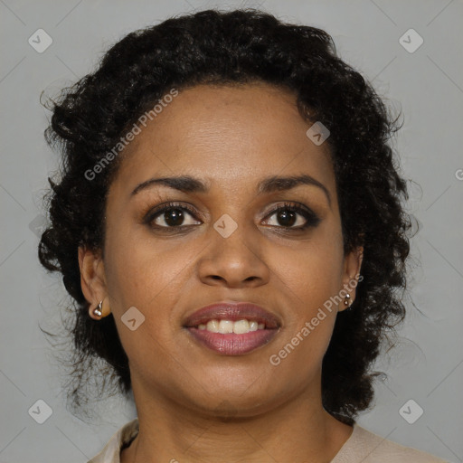 Joyful black young-adult female with medium  brown hair and brown eyes