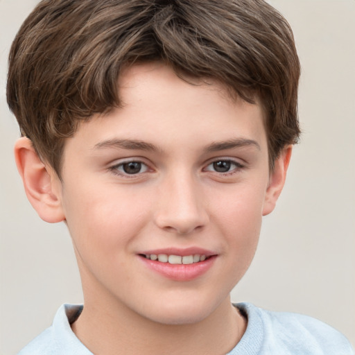 Joyful white child male with short  brown hair and brown eyes