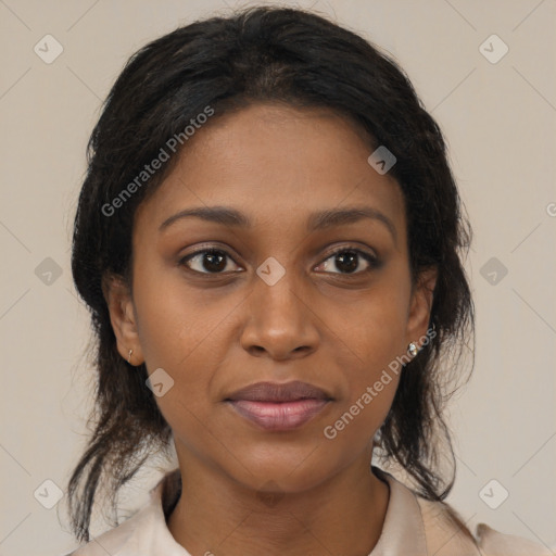 Joyful black young-adult female with medium  brown hair and brown eyes