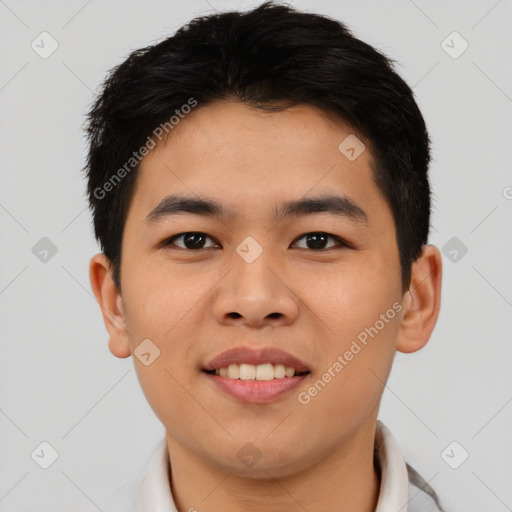 Joyful asian young-adult male with short  black hair and brown eyes