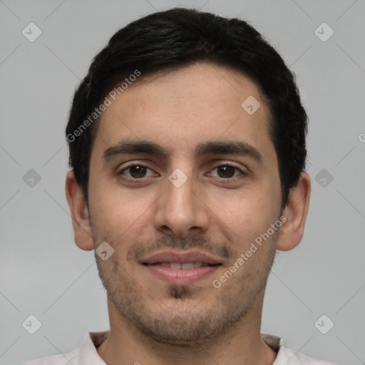 Joyful white young-adult male with short  black hair and brown eyes