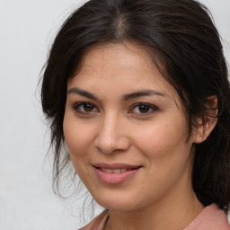 Joyful white young-adult female with medium  brown hair and brown eyes