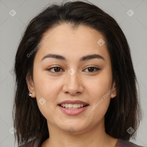 Joyful latino young-adult female with medium  brown hair and brown eyes