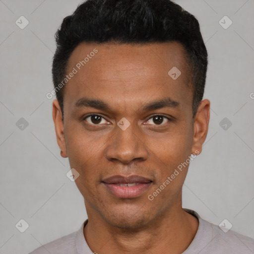 Joyful latino young-adult male with short  black hair and brown eyes