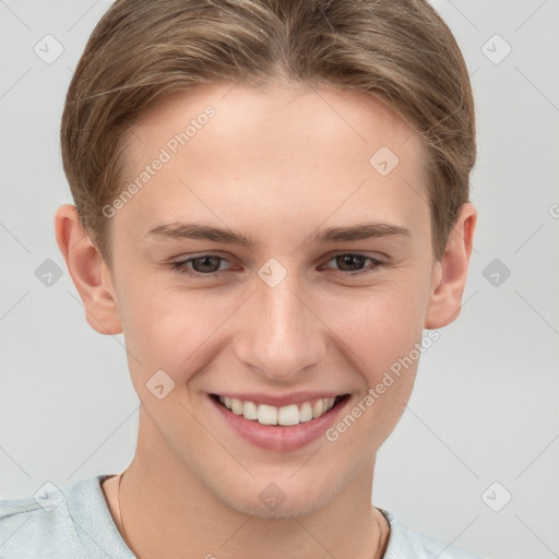 Joyful white young-adult female with short  brown hair and grey eyes