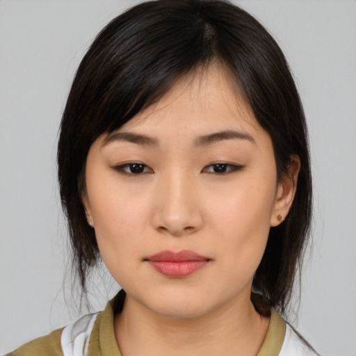 Neutral asian young-adult female with medium  black hair and brown eyes