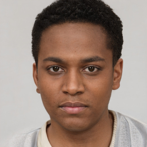 Neutral black young-adult male with short  brown hair and brown eyes
