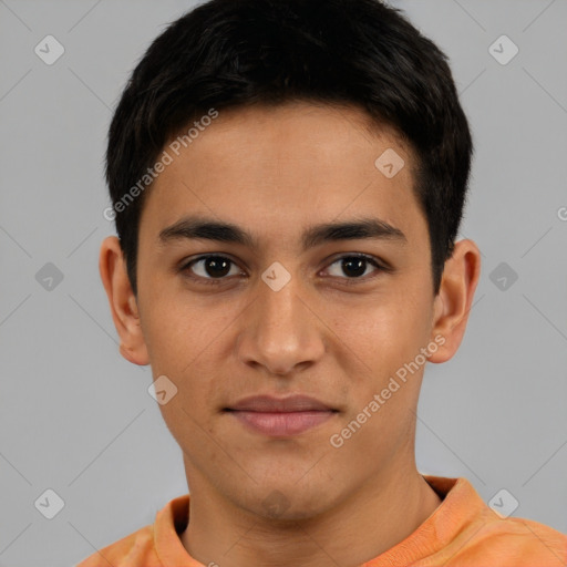 Joyful latino young-adult male with short  brown hair and brown eyes