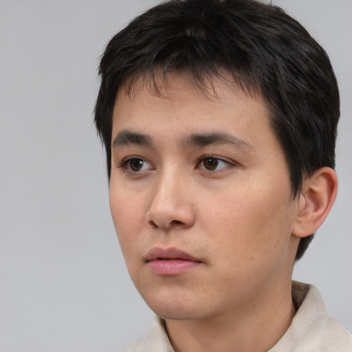 Neutral white young-adult male with short  black hair and brown eyes