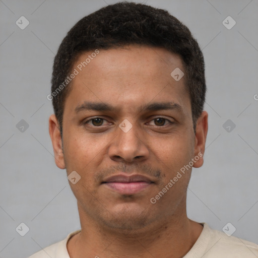 Joyful latino young-adult male with short  brown hair and brown eyes