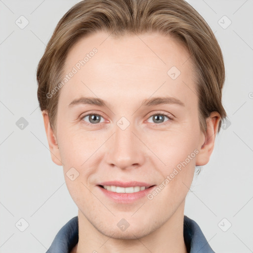 Joyful white young-adult female with short  brown hair and grey eyes