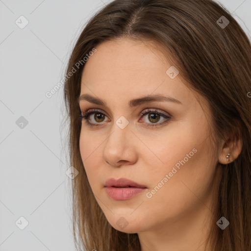 Neutral white young-adult female with long  brown hair and brown eyes