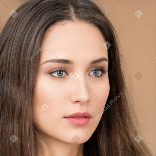 Neutral white young-adult female with long  brown hair and brown eyes