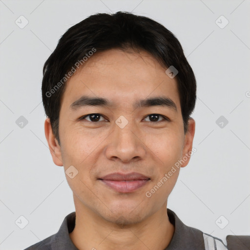 Joyful white young-adult male with short  black hair and brown eyes