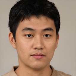 Neutral asian young-adult male with short  brown hair and brown eyes