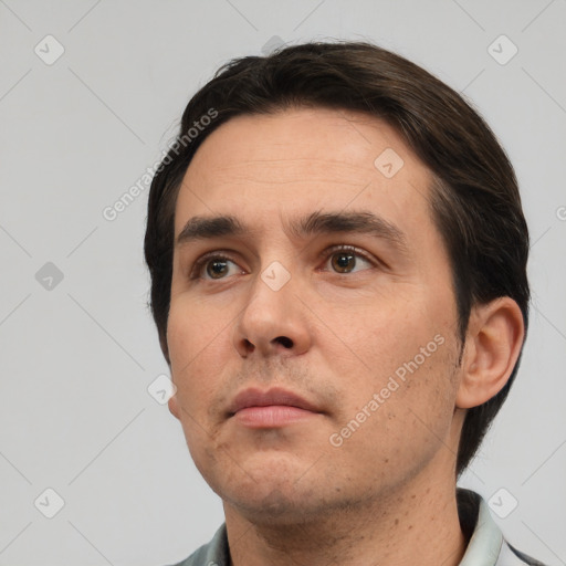 Neutral white adult male with short  brown hair and brown eyes