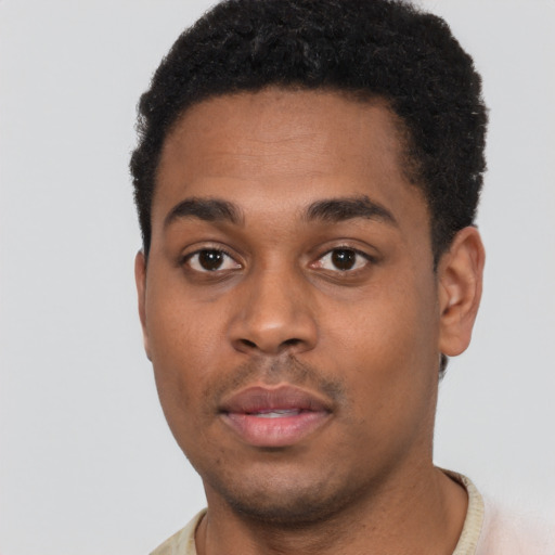 Neutral black young-adult male with short  black hair and brown eyes
