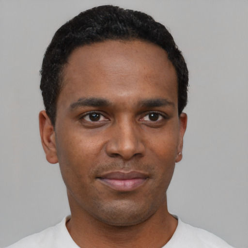 Neutral black young-adult male with short  black hair and brown eyes