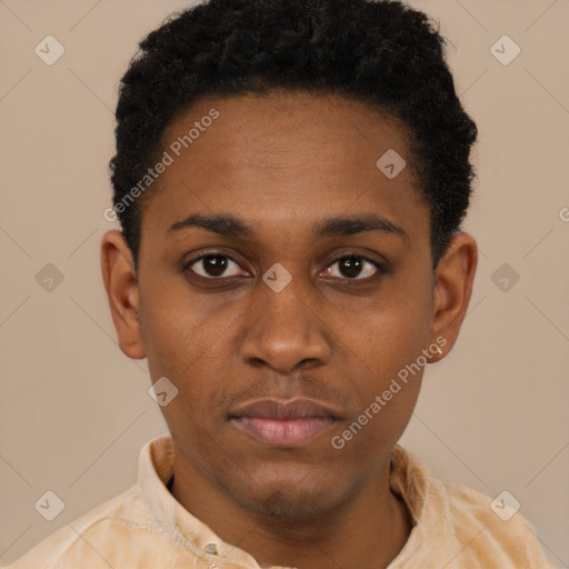 Neutral black young-adult male with short  black hair and brown eyes