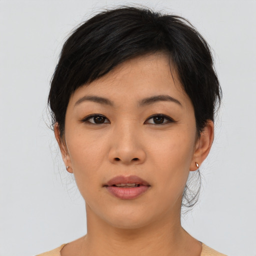 Neutral asian young-adult female with medium  black hair and brown eyes