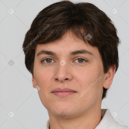 Joyful white young-adult female with short  brown hair and grey eyes