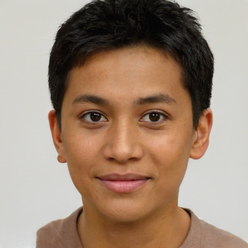 Joyful latino young-adult male with short  brown hair and brown eyes