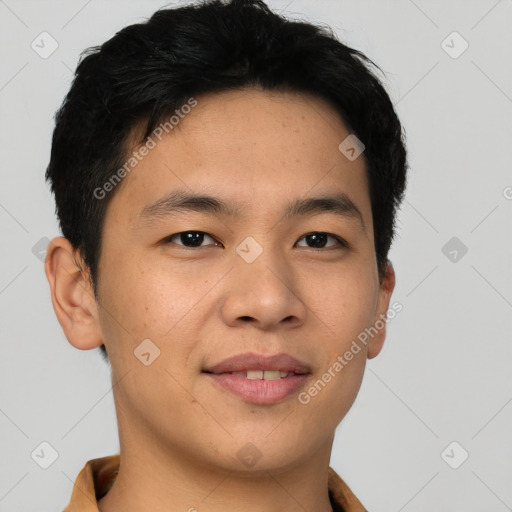 Joyful asian young-adult male with short  brown hair and brown eyes