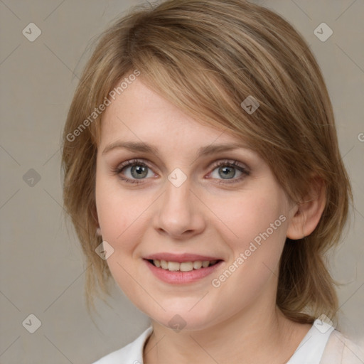 Joyful white young-adult female with medium  brown hair and blue eyes