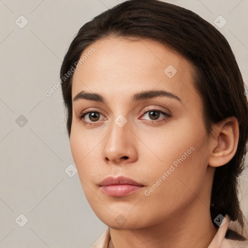 Neutral white young-adult female with medium  brown hair and brown eyes