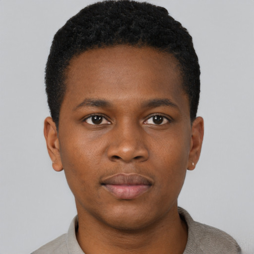 Neutral black young-adult male with short  brown hair and brown eyes
