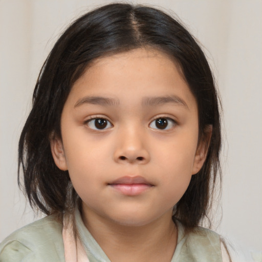 Neutral asian child female with medium  brown hair and brown eyes