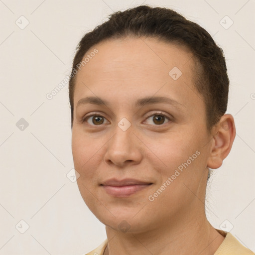 Joyful white young-adult female with short  brown hair and brown eyes