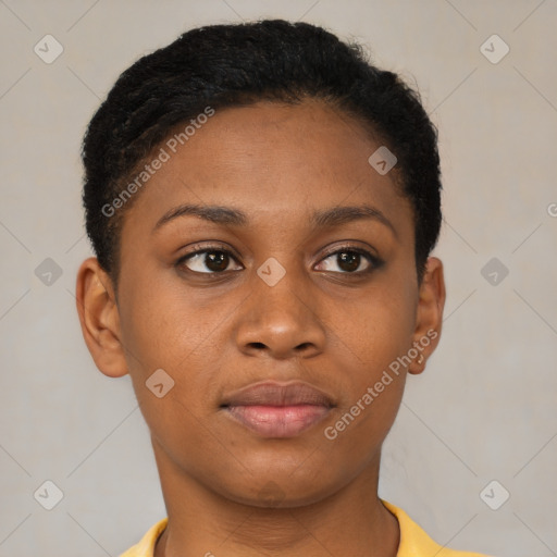 Joyful black young-adult female with short  brown hair and brown eyes