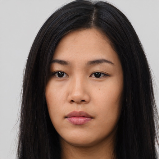 Neutral asian young-adult female with long  black hair and brown eyes