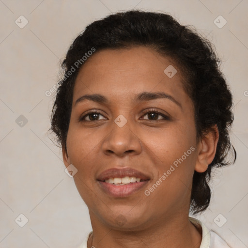 Joyful latino young-adult female with short  brown hair and brown eyes