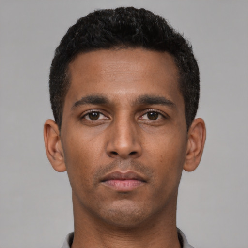 Neutral latino young-adult male with short  black hair and brown eyes