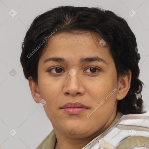 Joyful latino young-adult female with short  brown hair and brown eyes