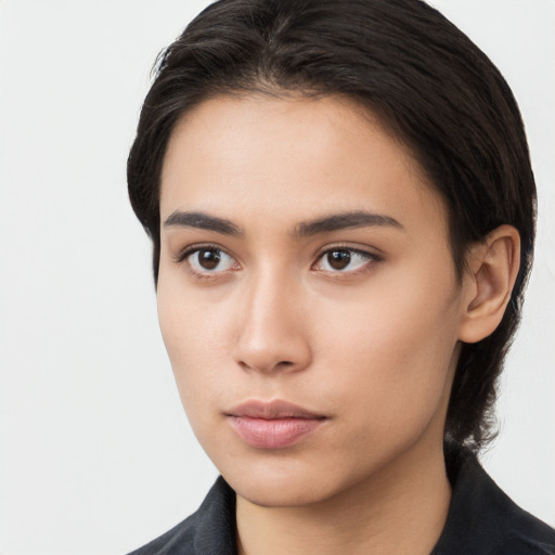 Neutral asian young-adult female with medium  brown hair and brown eyes