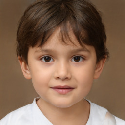 Joyful white child male with short  brown hair and brown eyes