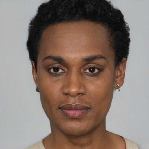Neutral black young-adult female with short  black hair and brown eyes